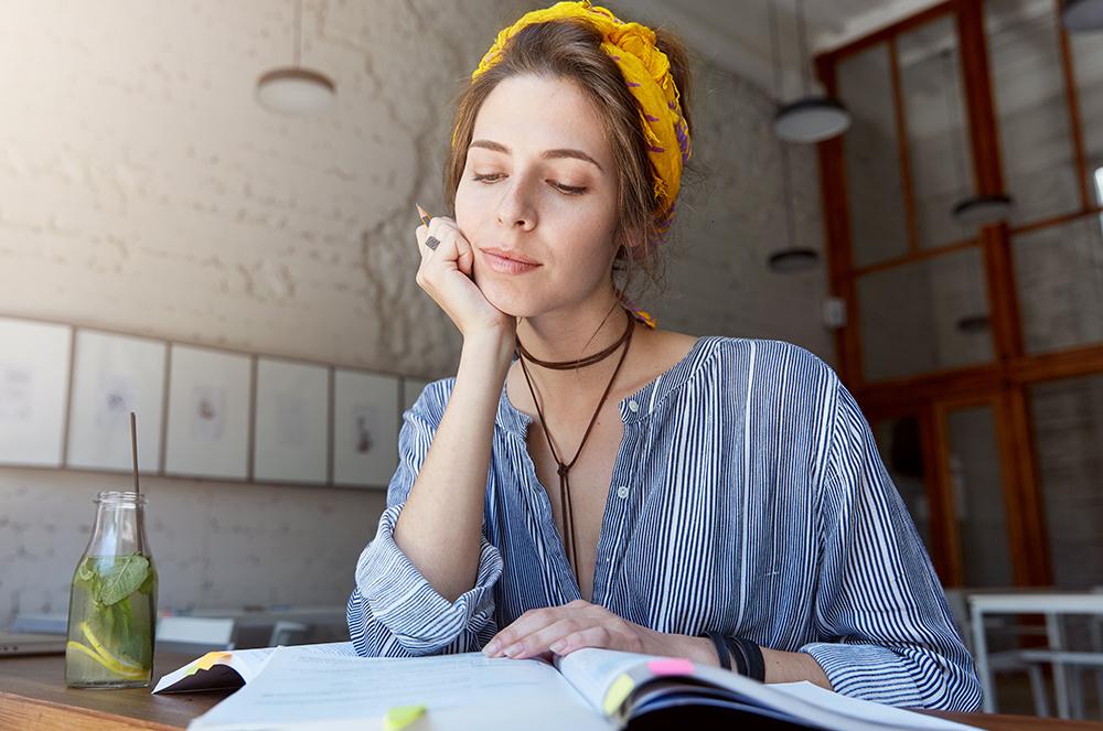 Thinking girl "What to write about?"